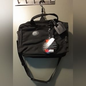 Black hanging toiletry bag with multiple storage pockets
